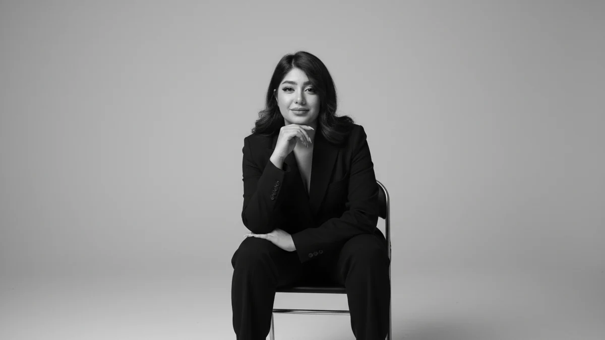 Black-and-white seated portrait of Zahra